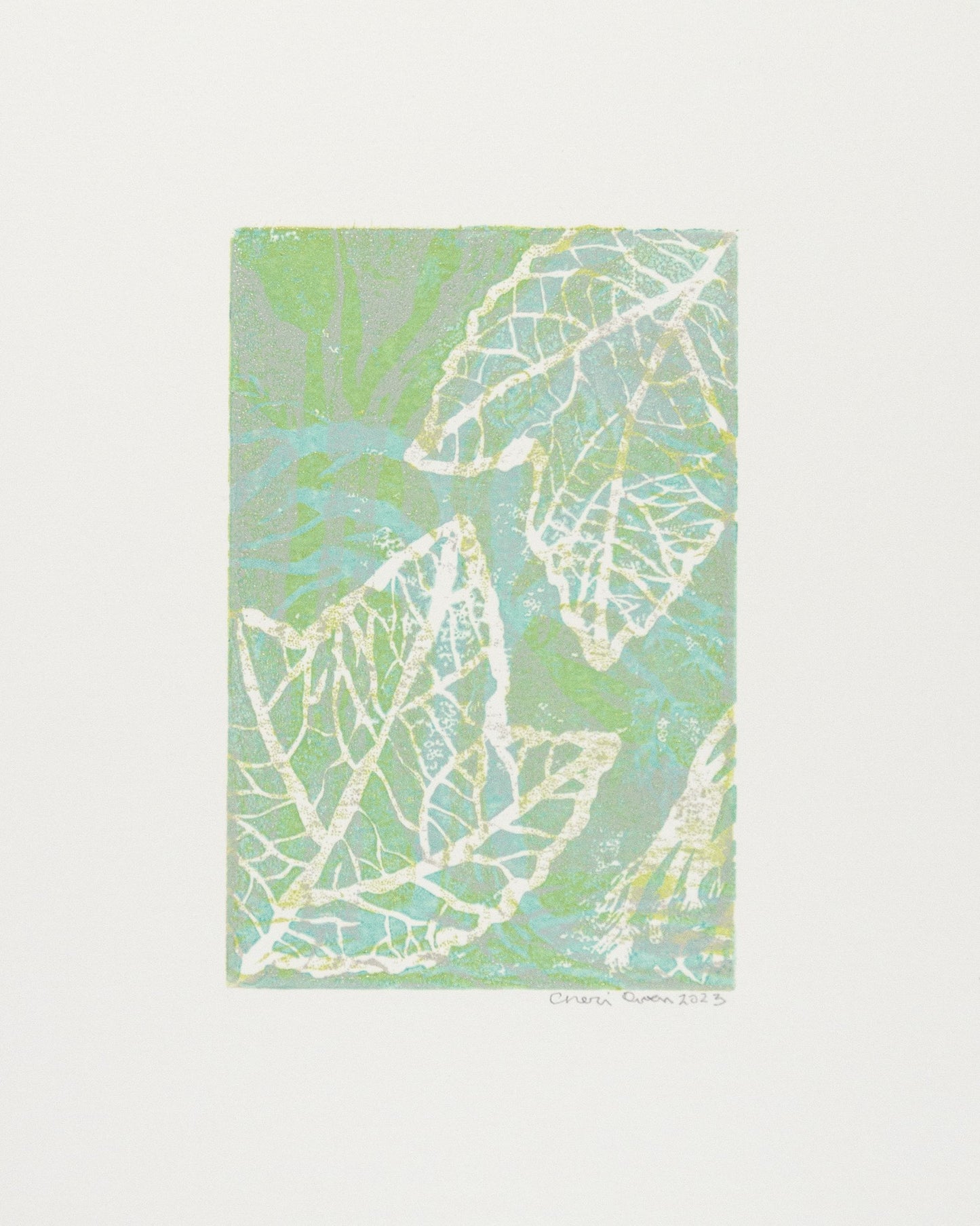 Artwork of green and blue leaves with white vein patterns signed by artist.