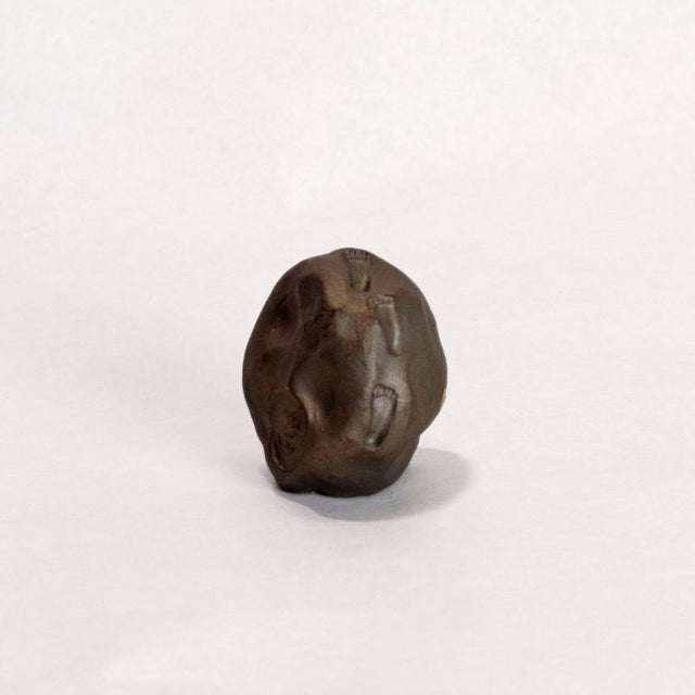 Dark brown ceramic sculpture 