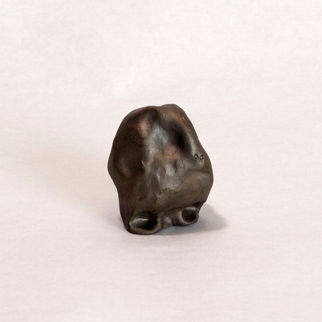 Dark brown ceramic sculpture 