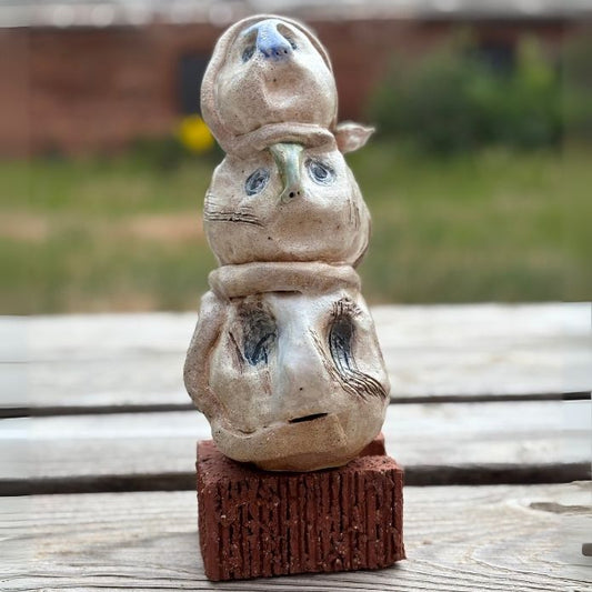 Front of ceramic sculpture with sculpted glaze and textures from Cheri Owen’s “Beautiful Monsters” Dream Protector
