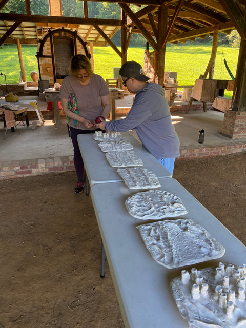 Cheri Owen working on her artwork for Forgive yourself. 