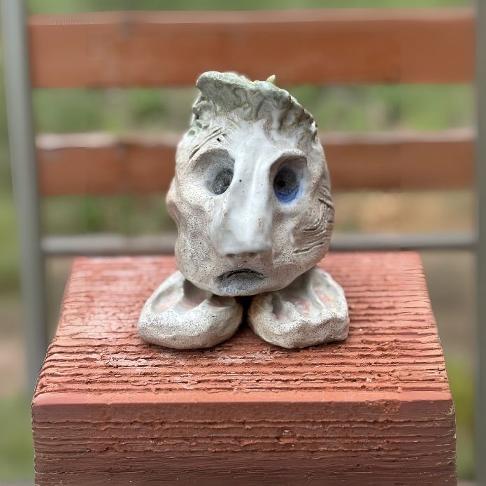 Front view of “I Am Strong” Dream Protector by Cheri Owen, featuring a tactile tree medallion and speckled glaze on textured stoneware.