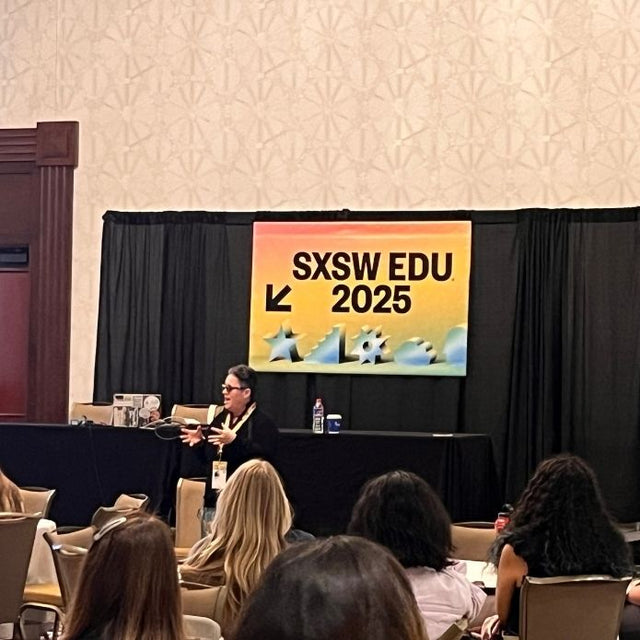 Cheri talking at a conference.